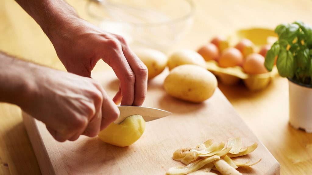 How are potatoes used for cleaning?